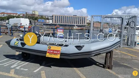 Zodiac Mk 2 Classic Sib Airdeck: starboard side profile on bow stand with marina pontoon gates in the background