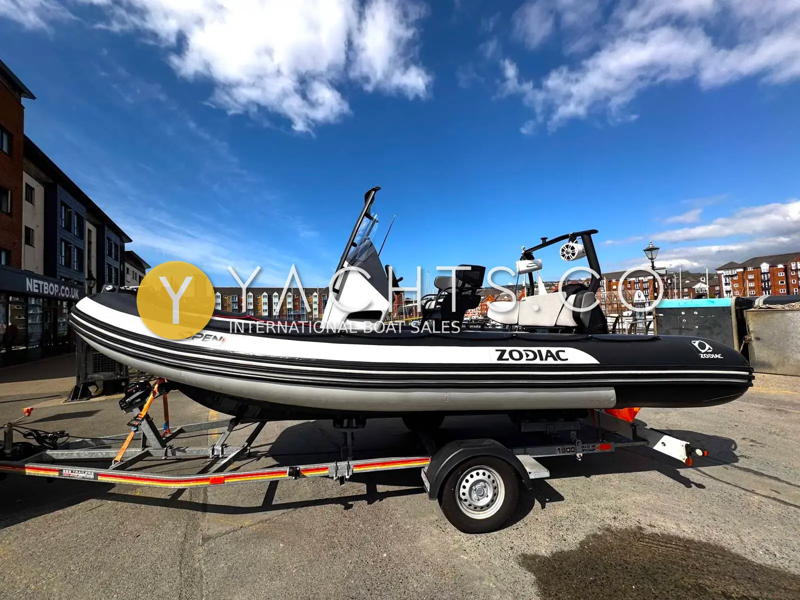 Zodiac Open 5.5 Rib: port side of the RIB on her road trailer, dark grey tubes and roll bar