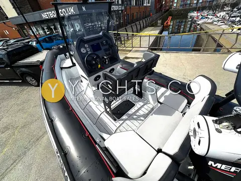 Zodiac Open 5.5 Rib: looking aft over the console and bolster seat to the grey and white cockpit